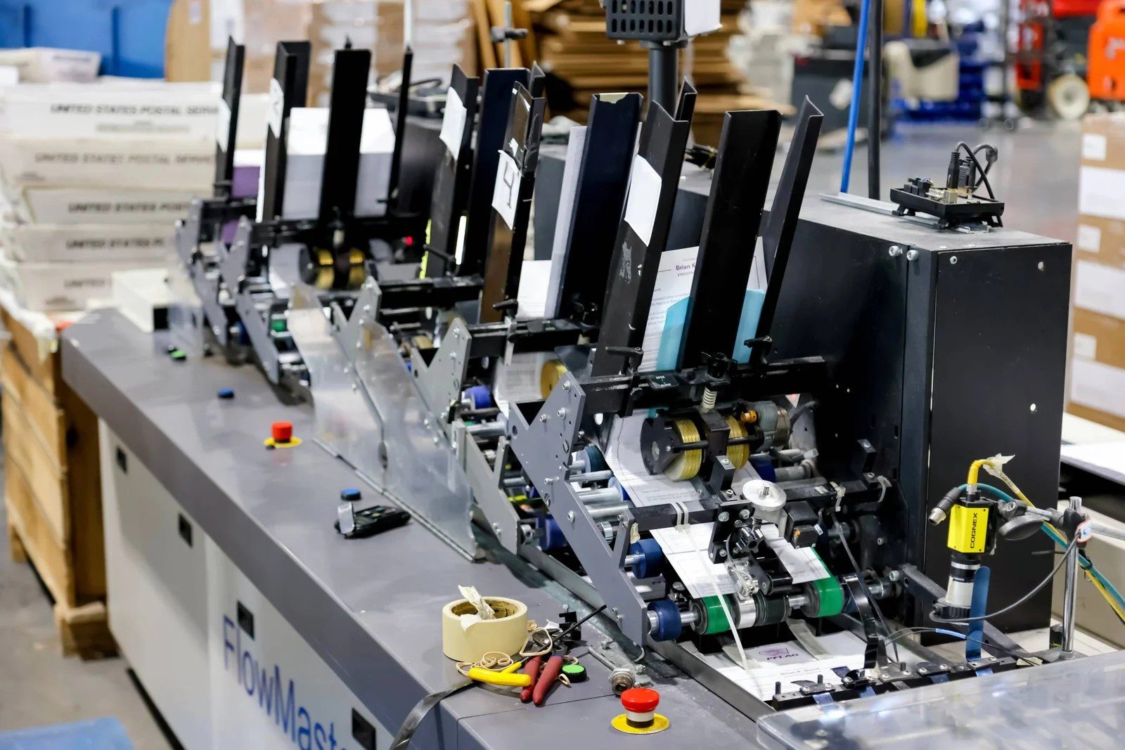 FlowMaster inserting line running direct mail at DIS Direct